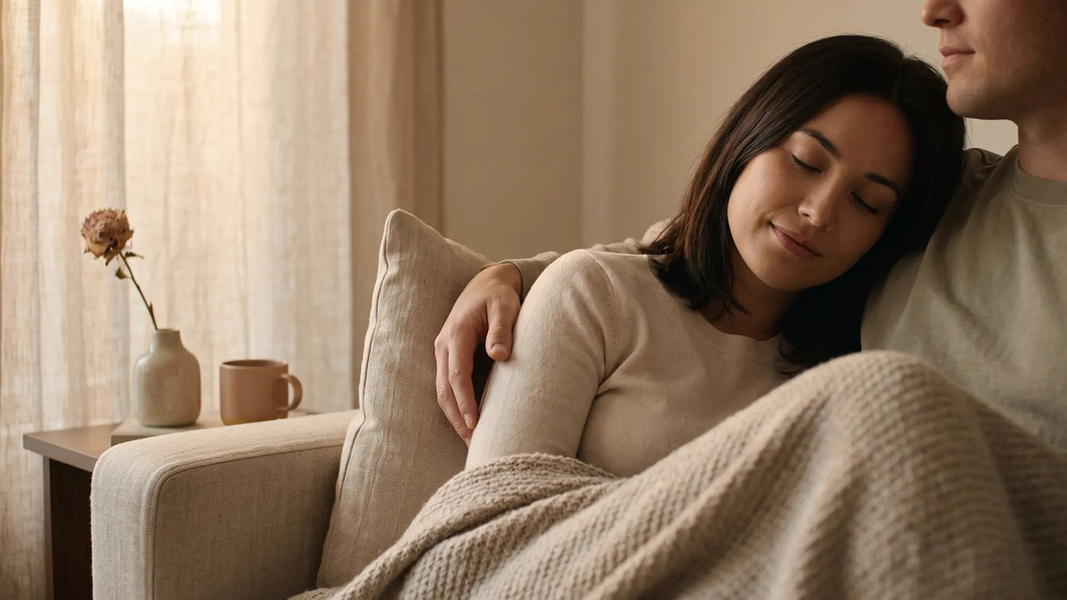 An INFP resting safely held by a partner, showing how to love an INFP gently